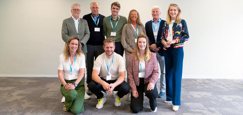 Groepsfoto deelnemers paneldebat netwerkbijeenkomst V&amp;V 2024