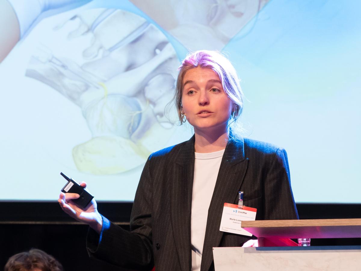 Marte Lommerse tijdens haar presentatie op het GGG-congres 2026