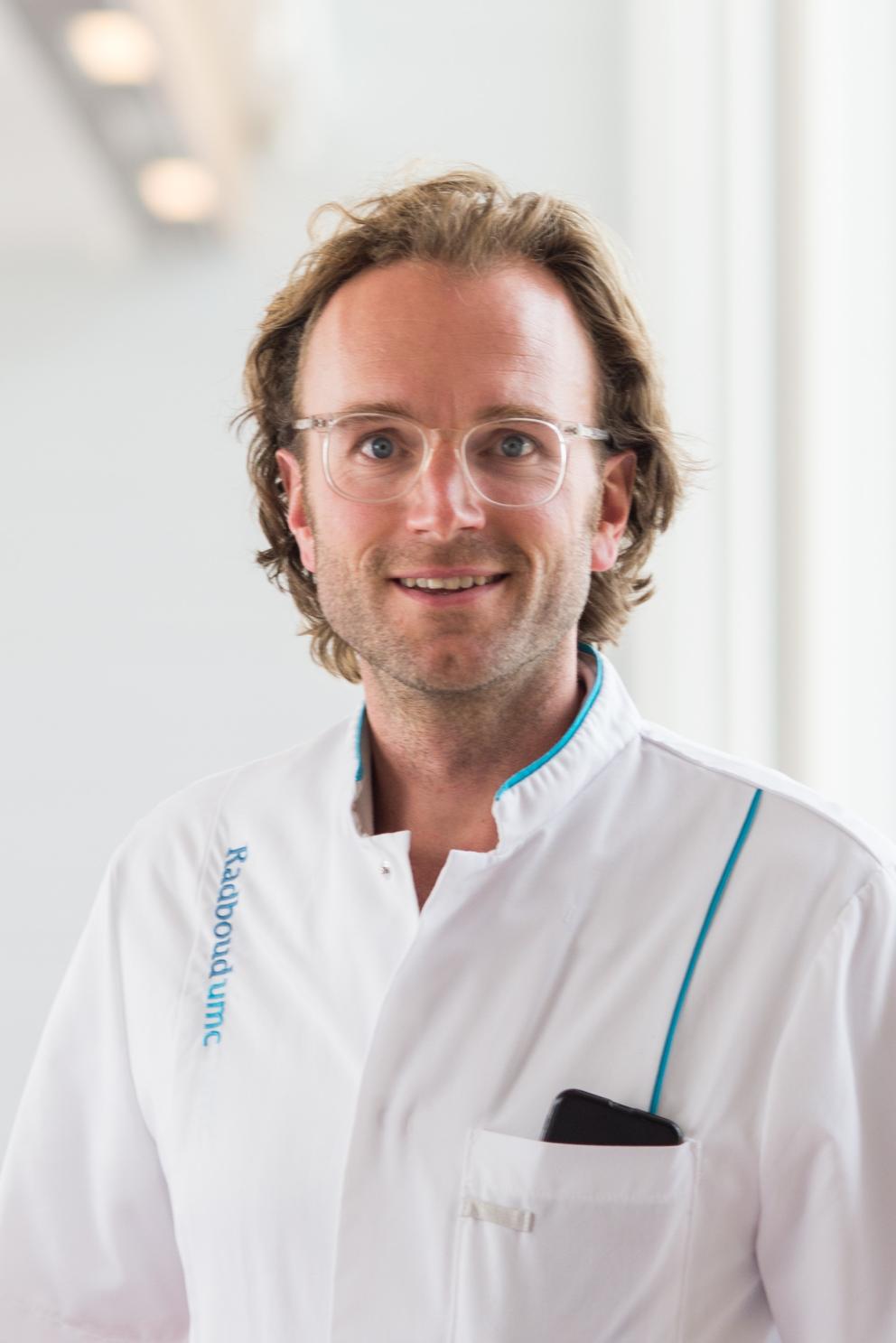 Portretfoto van Hugo Touw